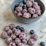 A bowl of homemade Cottage Cheese & Blueberry Snacks for Dogs, made with oats and fresh blueberries, perfect for a healthy pup treat.