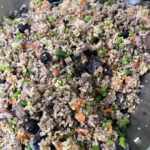 Homemade dog food recipe made with beef, liver, rice, sweet potatoes, peas, carrots, and blueberries. Packed with nutrients and perfect for batch freezing. This is a simple and cost-effective way to nourish your dog with real, wholesome food. Save this easy DIY meal plan and start prepping healthy meals your pup will love—try it today!